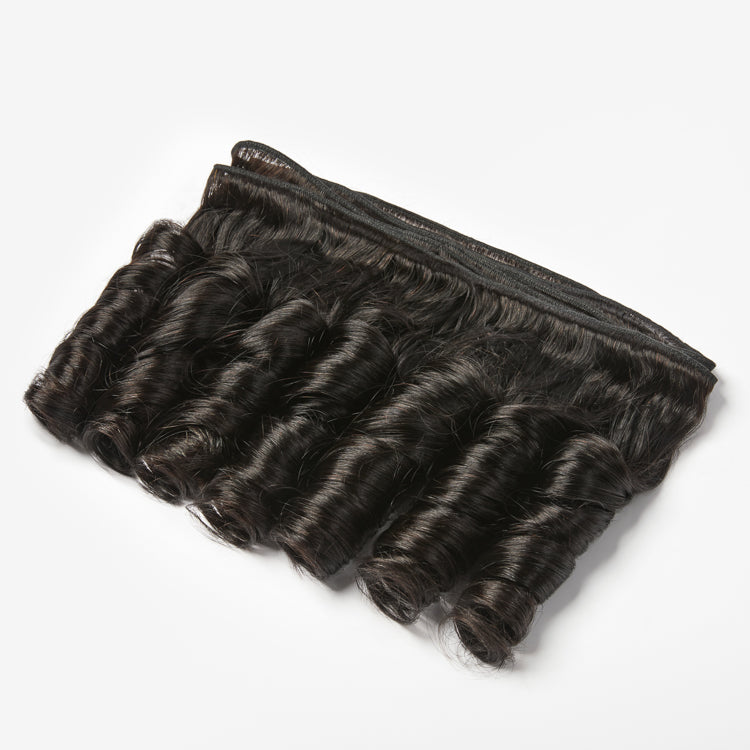 Three loose wave 100% virgin human hair bundles with natural shine, displayed in a close-up shot, branded by Luvme.