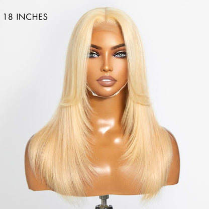 Blonde 613 layered curtain bangs 5x5 closure HD lace wig with natural parting and glueless design, styled for a seamless look.