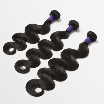 Three Brazilian body wave hair bundles from Luvme Hair, 100% virgin human hair, with a natural, wavy texture.