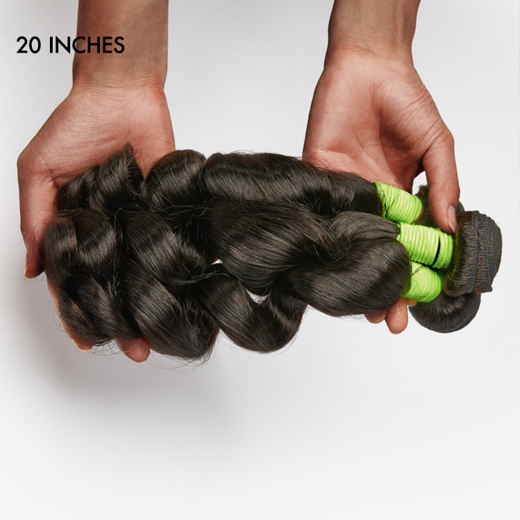 Luvme 100% human hair loose wave bundle, natural texture, soft and shiny, displayed on a mannequin head with styled hair
