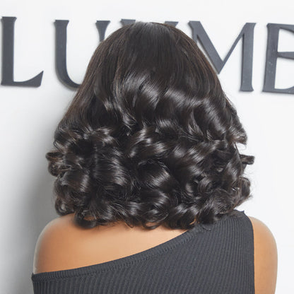Luvme All-Day Comfort™ voluminous loose body wave glueless HD lace wig with pre-cut lace, 200% density, minimalistic style.