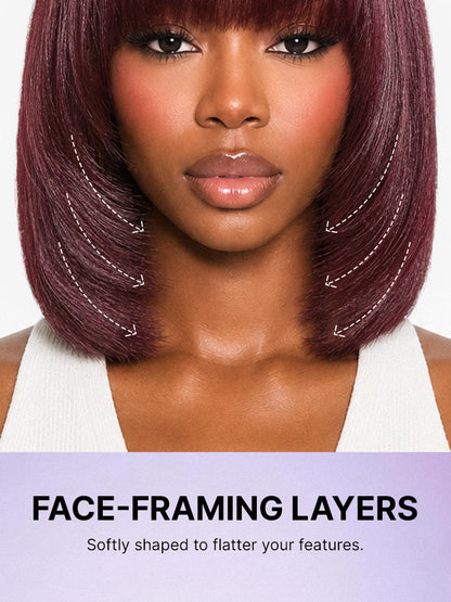 Reddish purple layered cut Yaki straight lace bob wig with bangs and comfort cap, styled for a minimalist, all-day wear look.