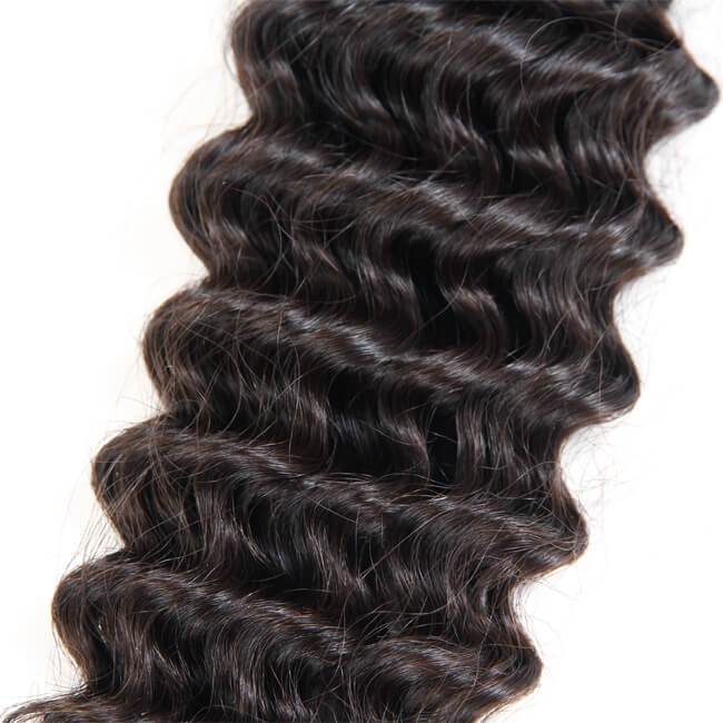 Three deep wave 100% virgin human hair bundles from Luvme, showcasing curly, textured hair bundles with natural shine.